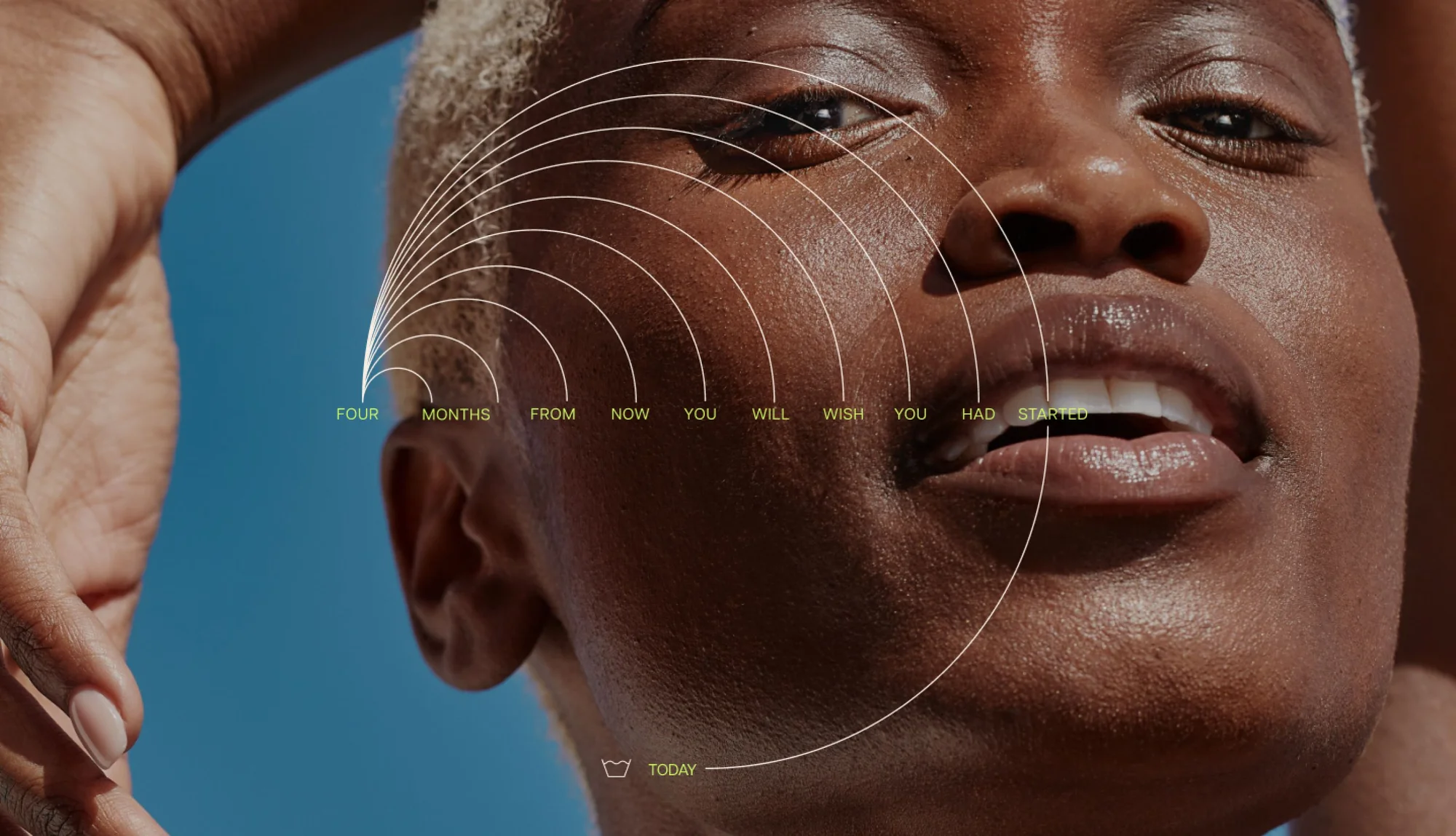 A person with short light-colored hair and dark skin looking up with a confident expression. Overlaid text reads, "FOUR MONTHS FROM NOW YOU WILL WISH YOU HAD STARTED TODAY," with lines radiating from the face.