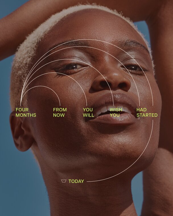 A person with short light-colored hair and dark skin looking up with a confident expression. Overlaid text reads, "FOUR MONTHS FROM NOW YOU WILL WISH YOU HAD STARTED TODAY," with lines radiating from the face.